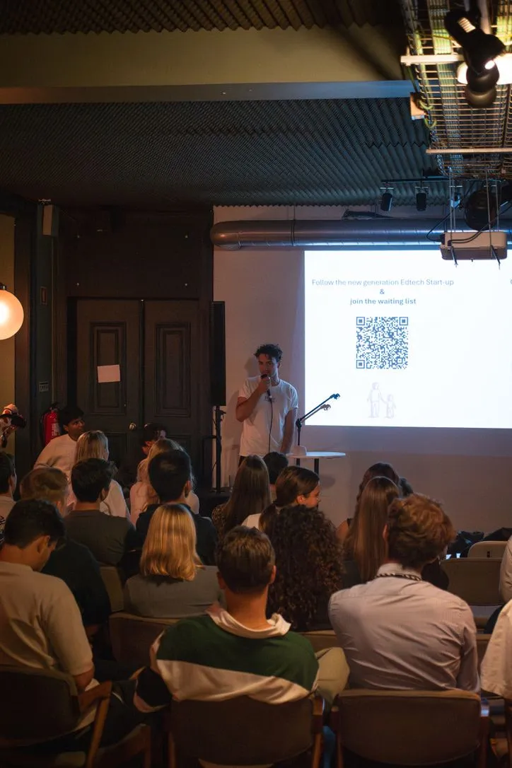 Leon pitching Lola Stories at Haddad Institute pitch competition